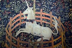 New York Cloisters 61 017 Unicorn Tapestries - The Unicorn in Captivity - the unicorn is tethered to a tree and constrained by a fence.jpg